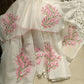 White Kota Doria cotton saree with pink floral embroidery and blouse